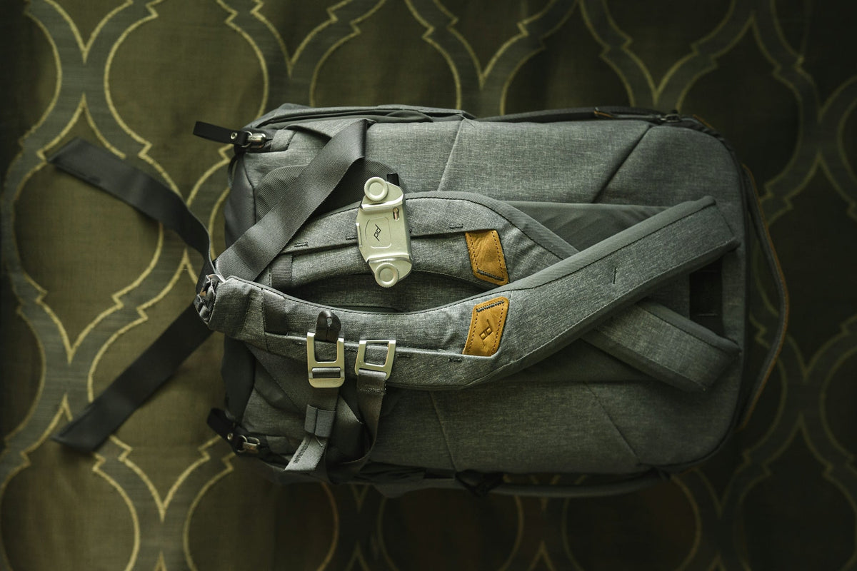 black leather handbag on black textile