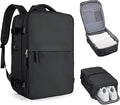 Black backpack with open compartments showing organized items on a white background