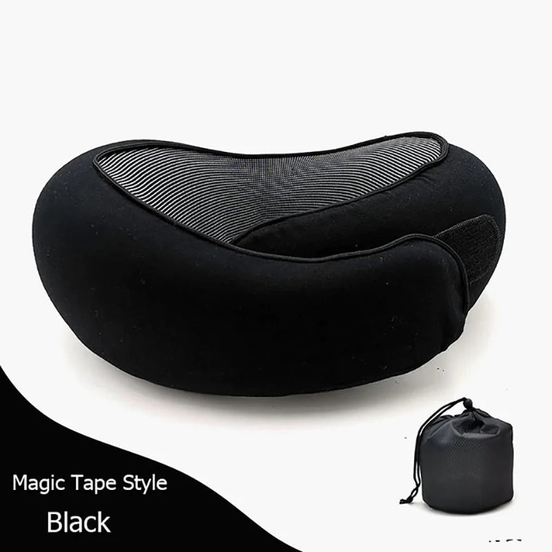 Black neck pillow with carrying bag on a white background
