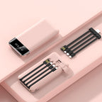 Pink electronic device with black accents on a matching pink background