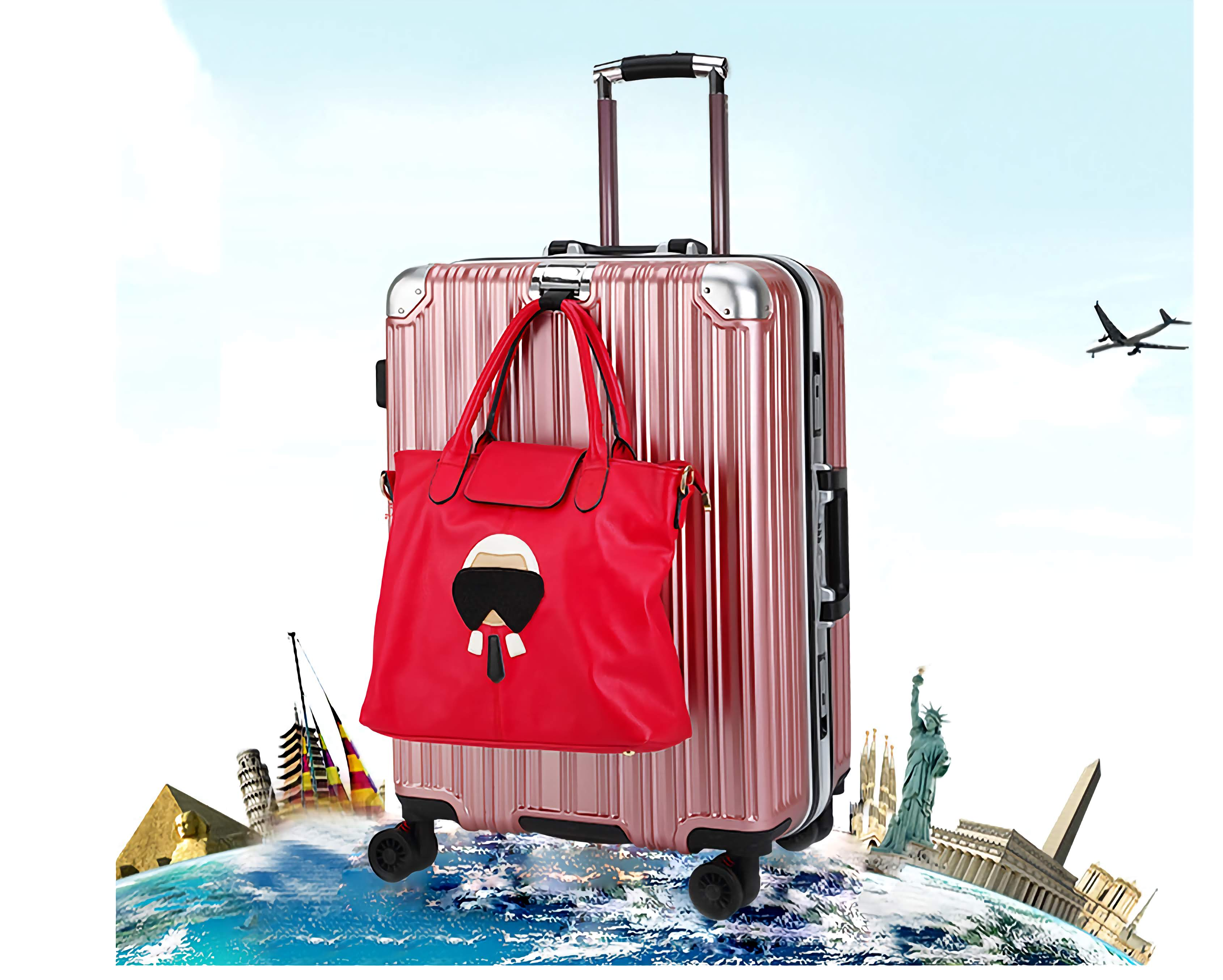 Pink suitcase with a red handbag featuring a face design, airplane, world map, and landmarks in the background.