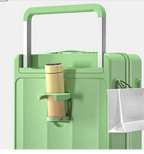 Green suitcase with a water bottle holder attached on a white background