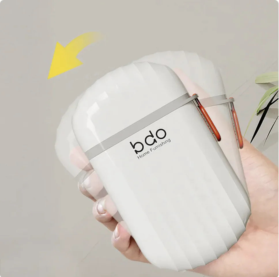 White  soap case held by a hand against a neutral background