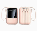 Rose gold power bank with digital display and multiple ports on a white background