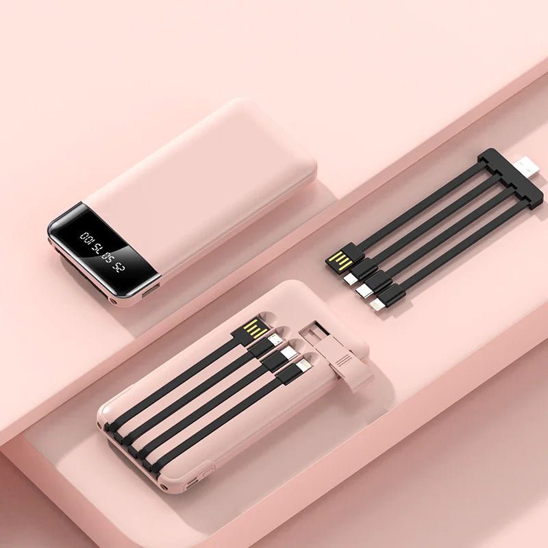 Smartphone charger with power bank and charging cable on a pink surface