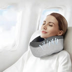 Woman using a neck pillow on a plane