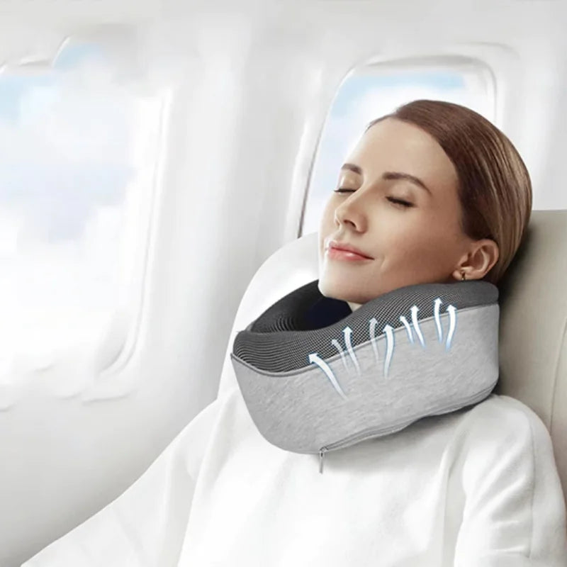 Woman using a neck pillow on a plane